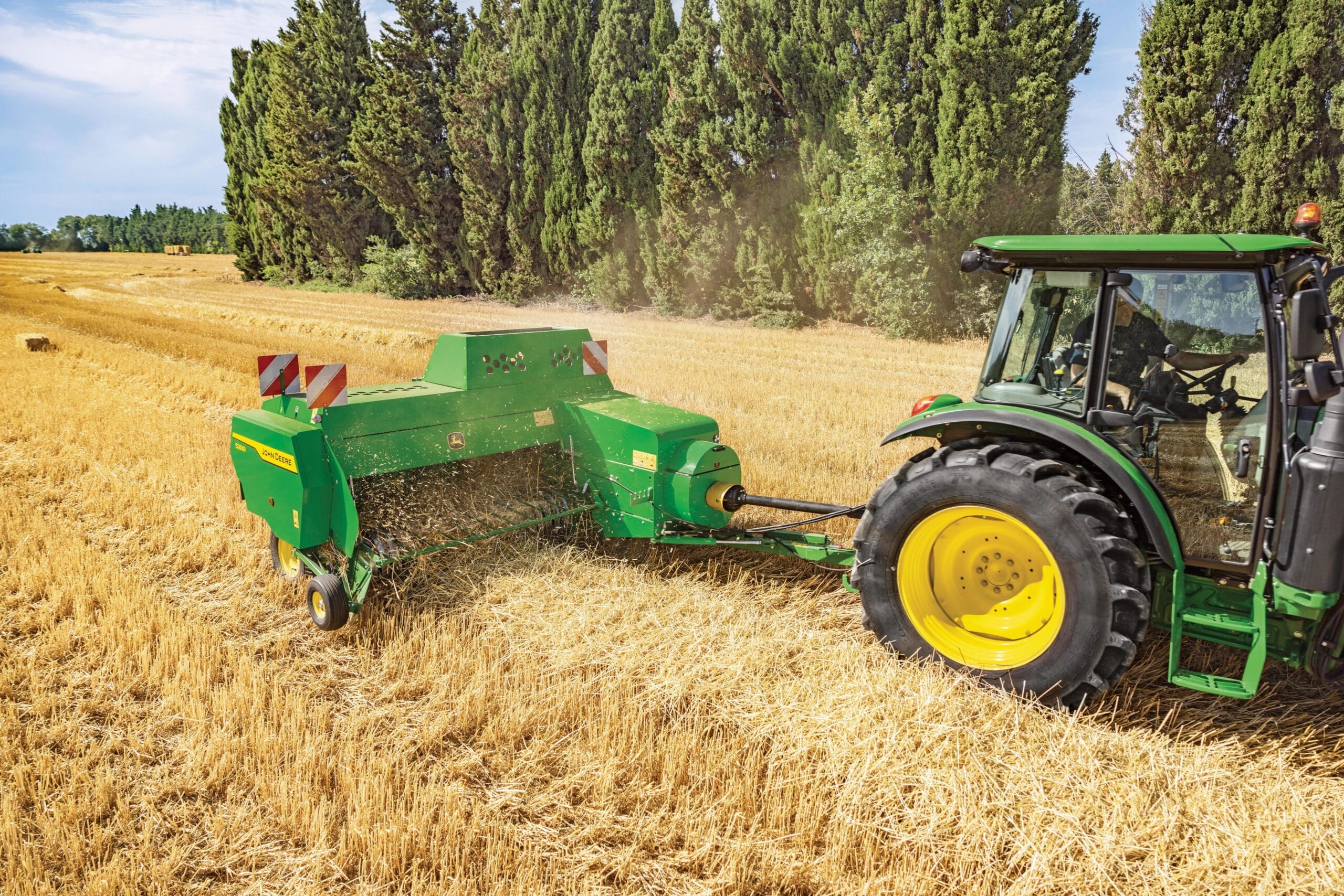 John Deere mit Presse